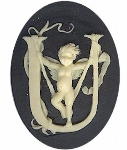 Item#157x Acrylic 40x30 black/ivory letter "U" cameo