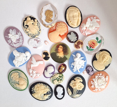 Collection of decorative cameos on a white background