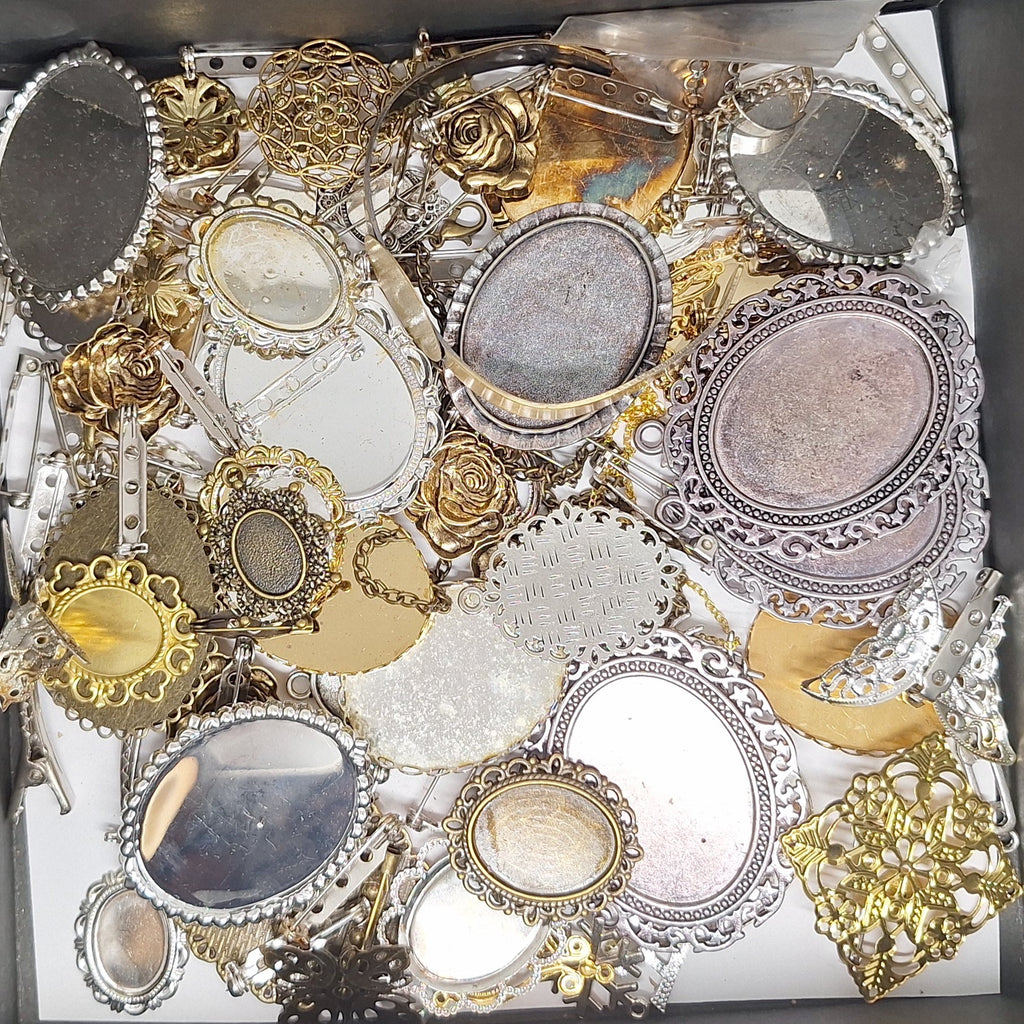 READ DESCRIPTION Settings, Plated Stampings Jewelry Findings  (SECONDS and DISCONTINUED) 1/2LB L628